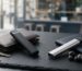 Infographic showcasing premium discreet and portable vapes UK market trends, illustrating sleek stealth vaping devices and compact pocket-sized e-cigarettes on a wooden desk.