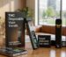 A sleek, matte-black rechargeable disposable THC vape pen standing upright next to its premium cardboard packaging.